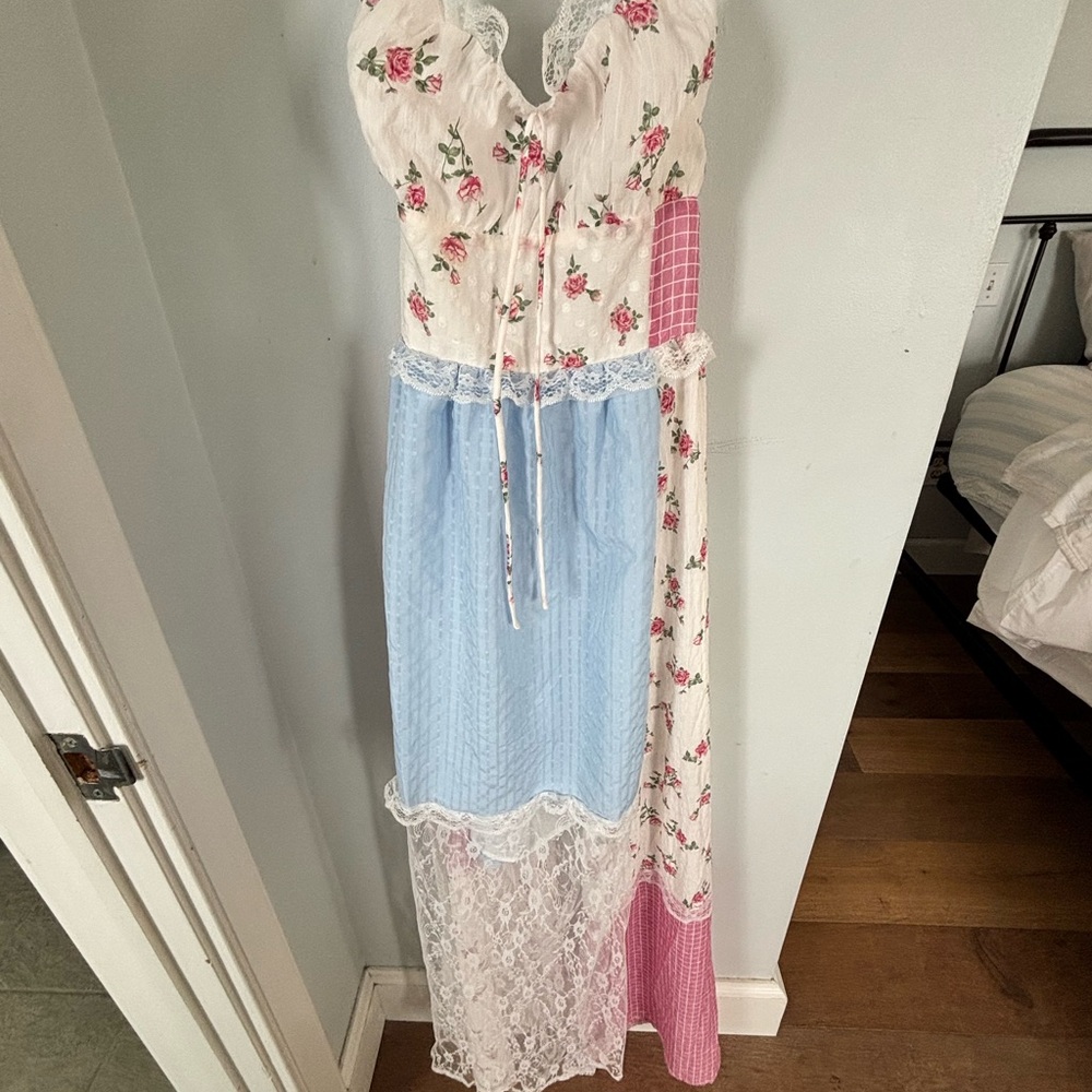 NWT Cattivo maxi dress ties at neck and down back. Low back. Lace at bottom.